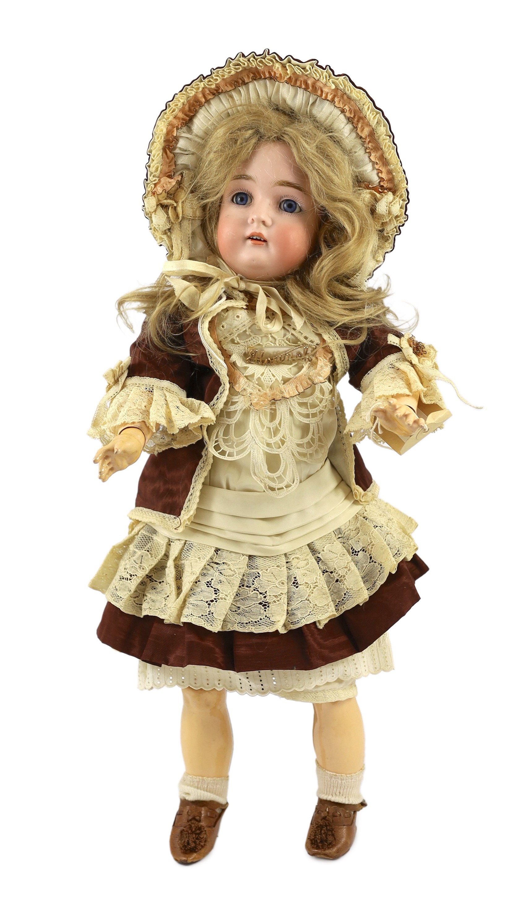 A J.D. Kestner bisque doll, German, circa 1905, 20in.